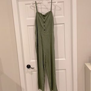 Green jumpsuit with pockets